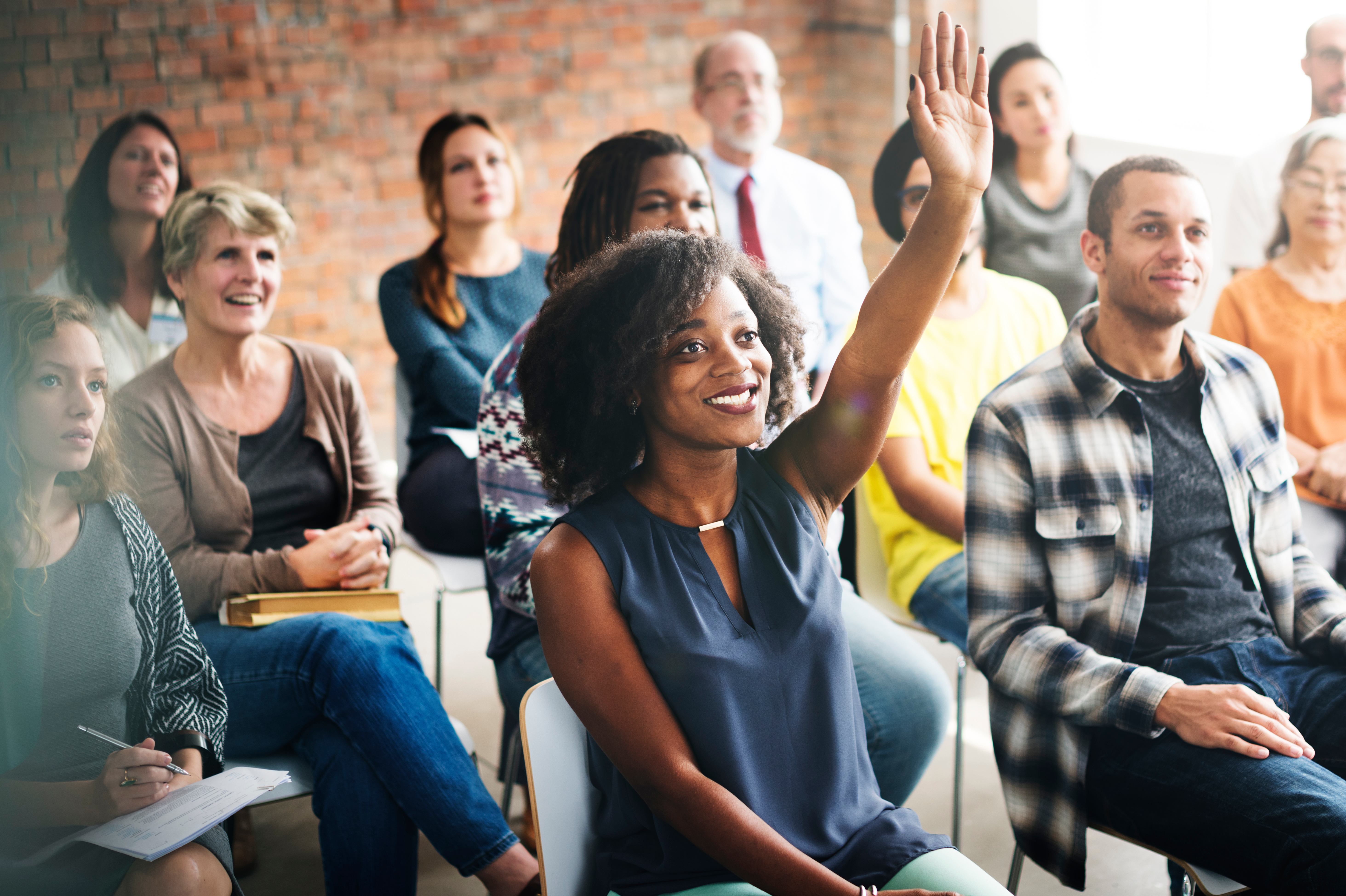 Black woman raises her hand during LGBTQ training Pittsburgh